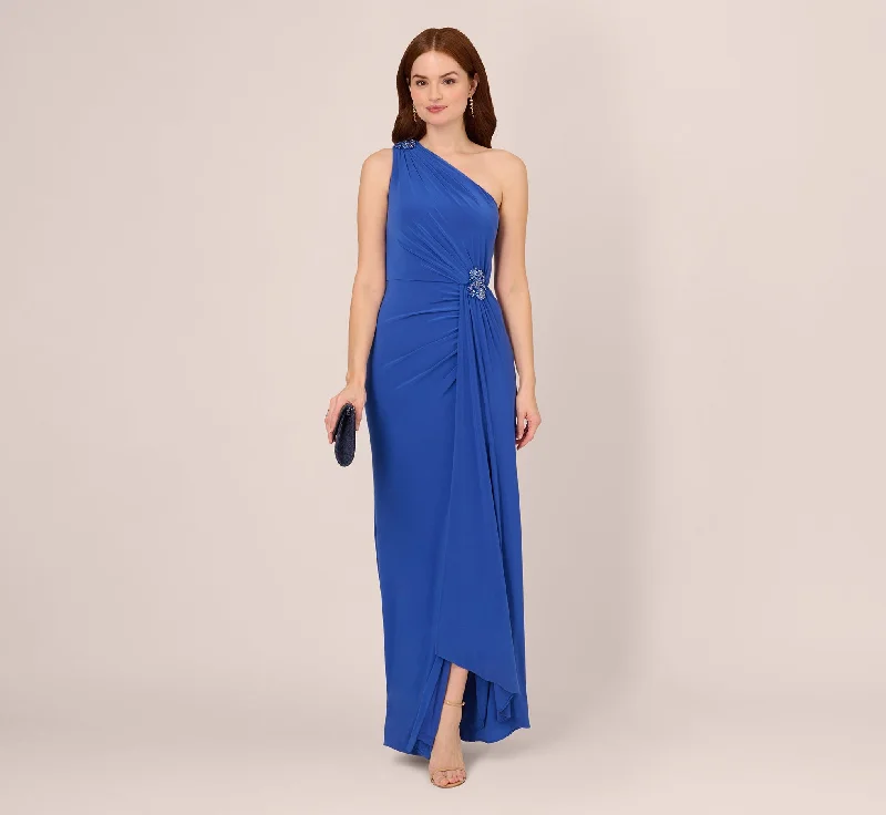 One Shoulder Draped Jersey Gown With Floral Sequin Accents In Brilliant Sapphire