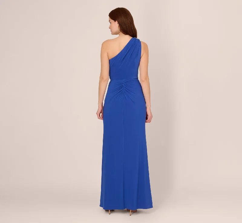 One Shoulder Draped Jersey Gown With Floral Sequin Accents In Brilliant Sapphire