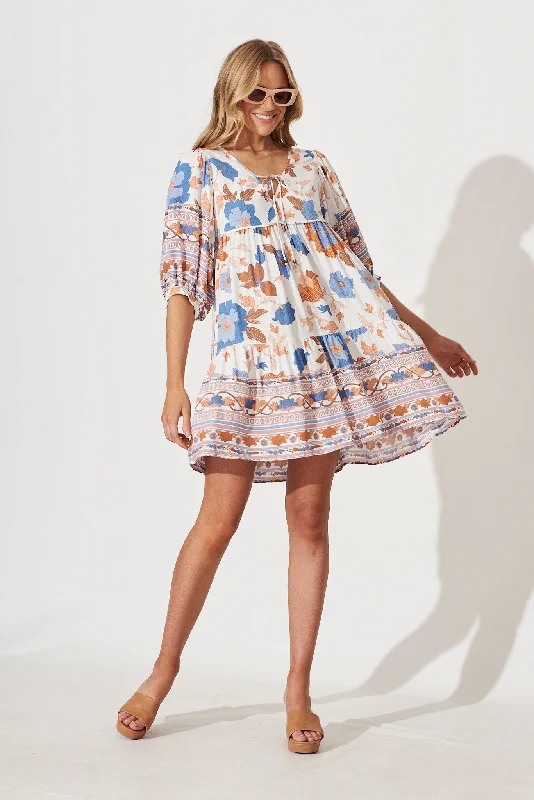 Get More, Spend Less – Shop Now!Wednesday Smock Dress In White With Rust Boho Floral